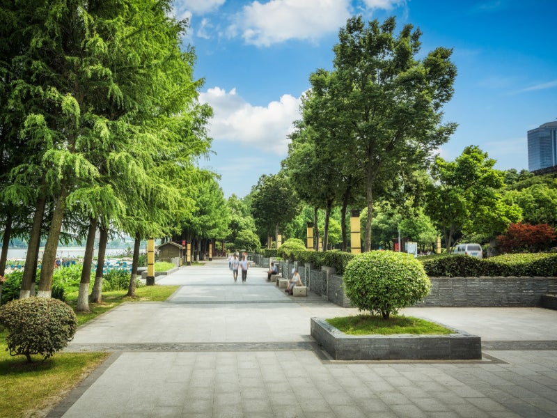 Image of a couple sigining document with finance team