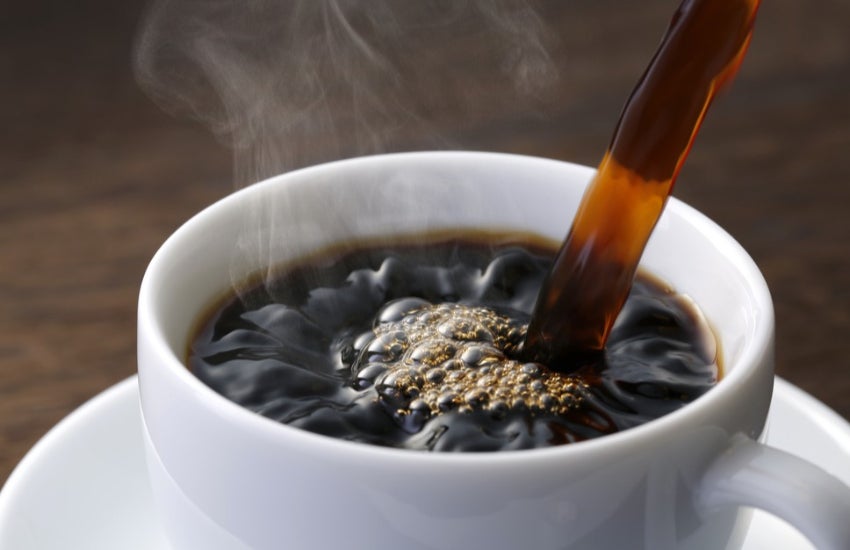 Image of a coffee pouring in the cup